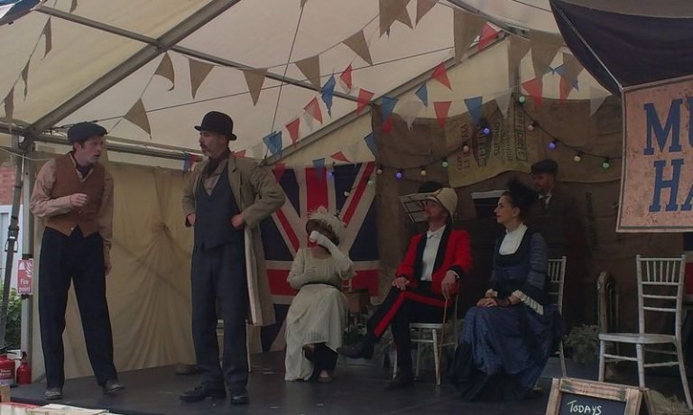 Great Fete mid shot of actors on stage