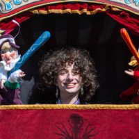 Spike Bones head between Punch and Judy in booth Spike Bones head between Punch and Judy in booth